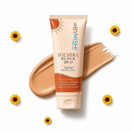 ByMishi Solmira tinted sunblock SPF 65 tube with a swatch of the lightweight formula, surrounded by small sunflowers.
